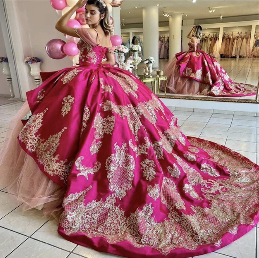 hot pink quinceanera ornate with long train