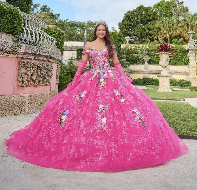 hot pink quinceanera with floral details in garden