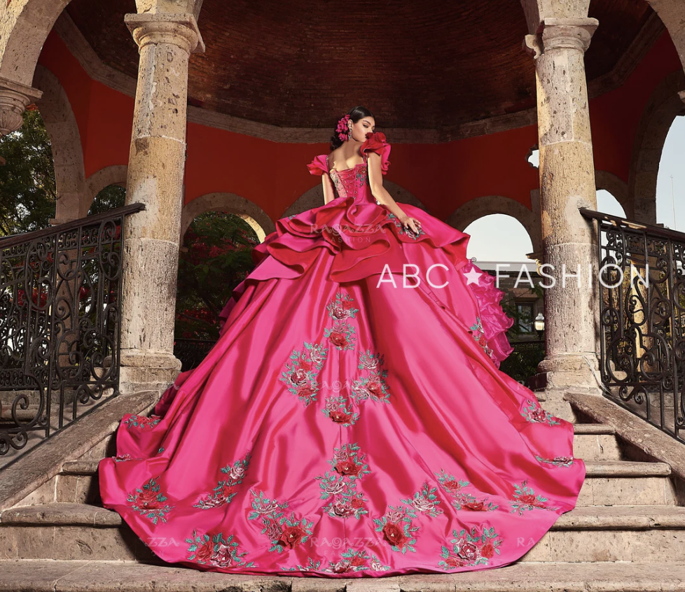 hot pink quinceanera dress with large skirt and roses