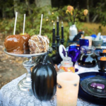 outdoor halloween themed tea party with caramel apples