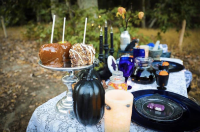 outdoor halloween themed tea party with caramel apples