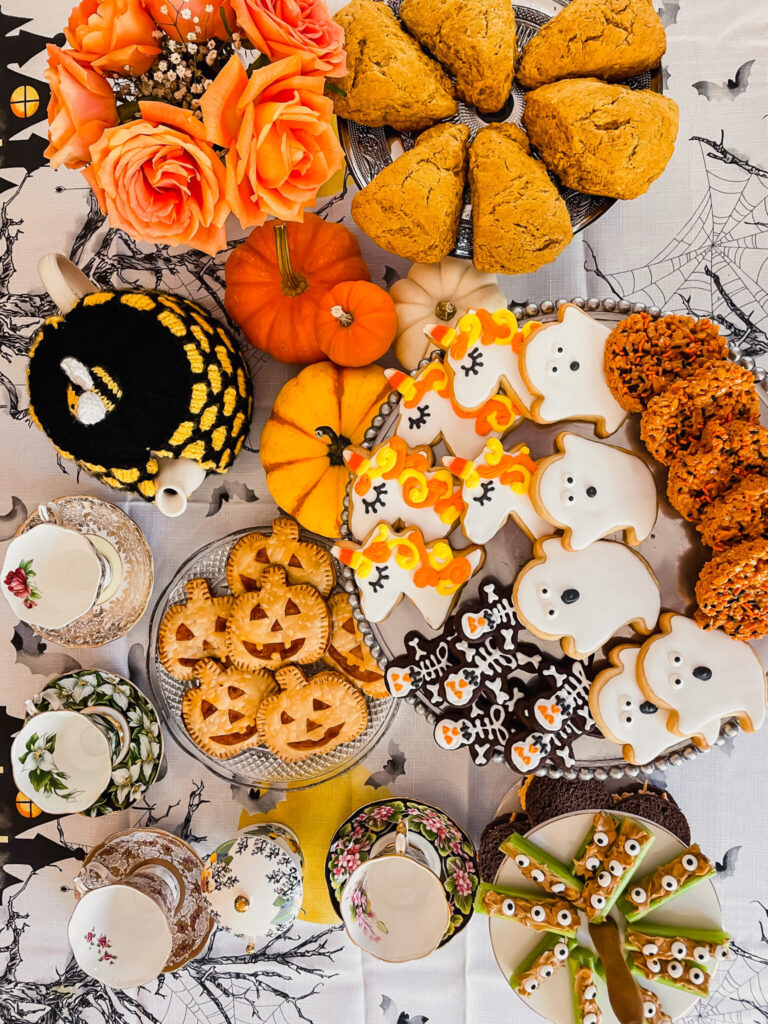 halloween charcuterie tray with pumpkin shaped pies